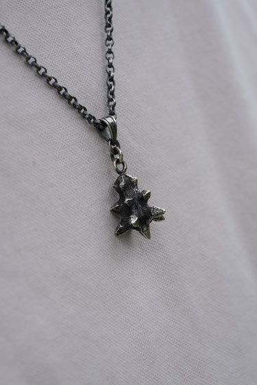 The Witch king flail pendant from the lord of the rings